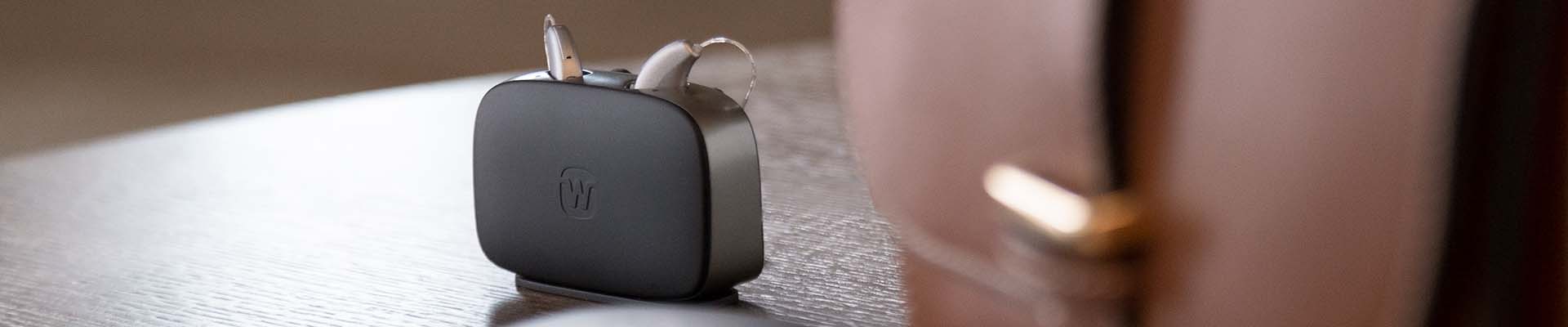 Widex Moment Sheer - sRIC hearing aids in charger